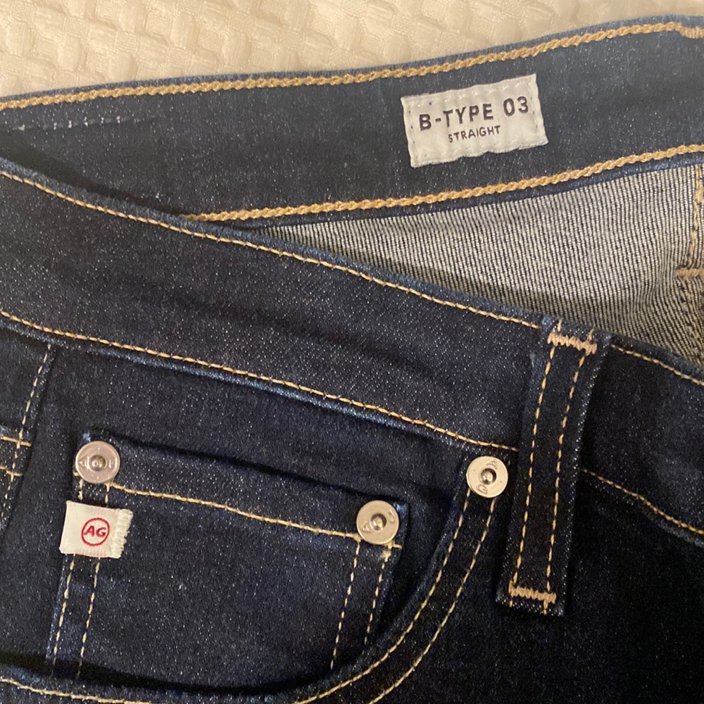Ag dark blue jeans. Straight fit. Brand new! Never worn without tags. Beautiful!